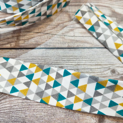 Geometric Teal Bias Binding