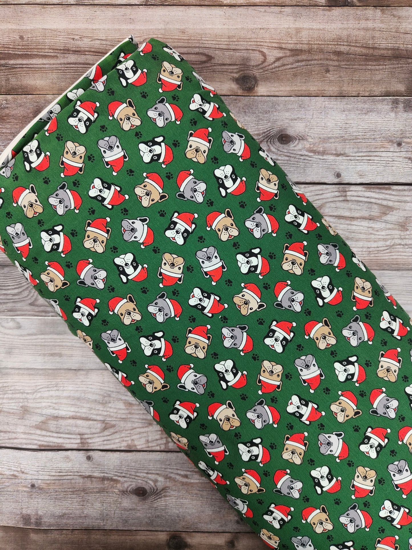 Festive Dogs on Green Cotton Jersey 53cm